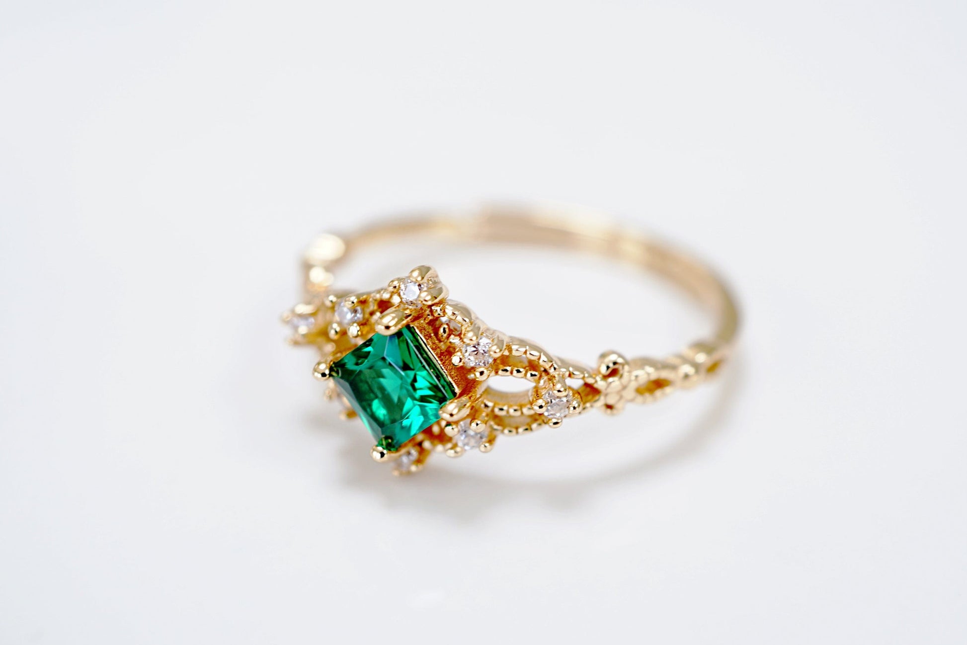 14K Gold 14K Gold Vermeil Princess Cut Green Crystal Ring Discover the 14K Gold Vermeil Princess Cut Green Crystal Ring - Vintage Style, Adjustable, Perfect Stacking Gift