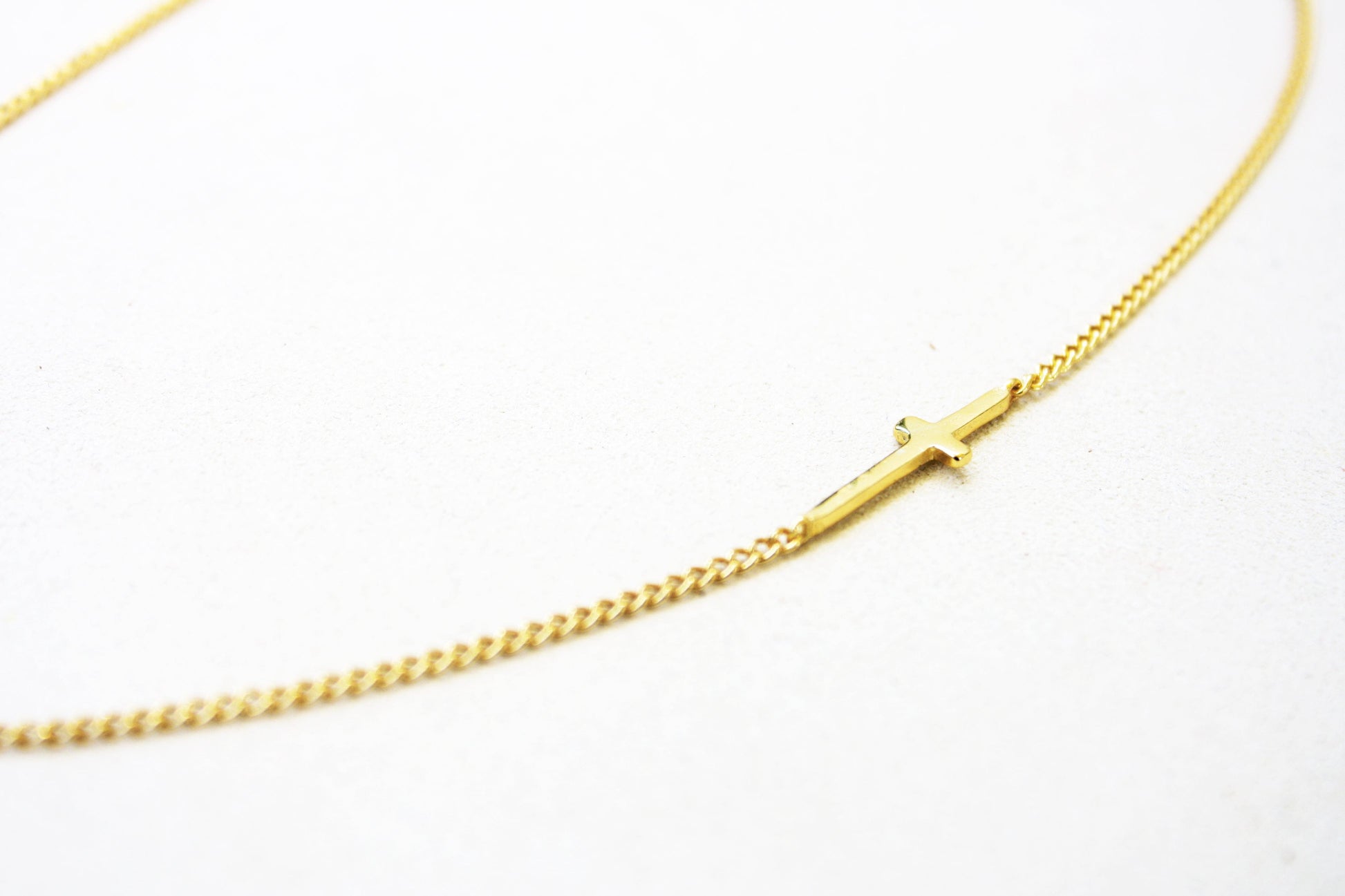 18K Gold 18K Gold Sideways Cross Choker Necklace Discover the Elegance of an 18K Gold Sideways Cross Choker Necklace - Perfect Layered Minimal Jewelry