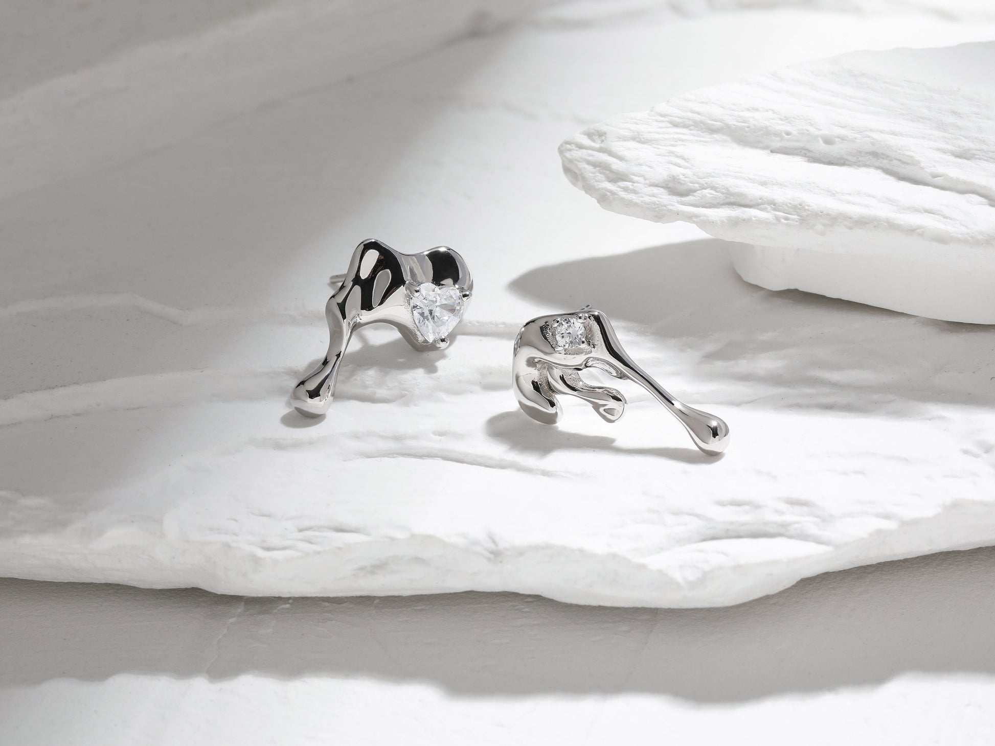 Edgy Dripping Metal CZ Earrings Edgy Dripping Metal CZ Earrings: Bold Statement Lava and Melting Liquid Designer Earrings