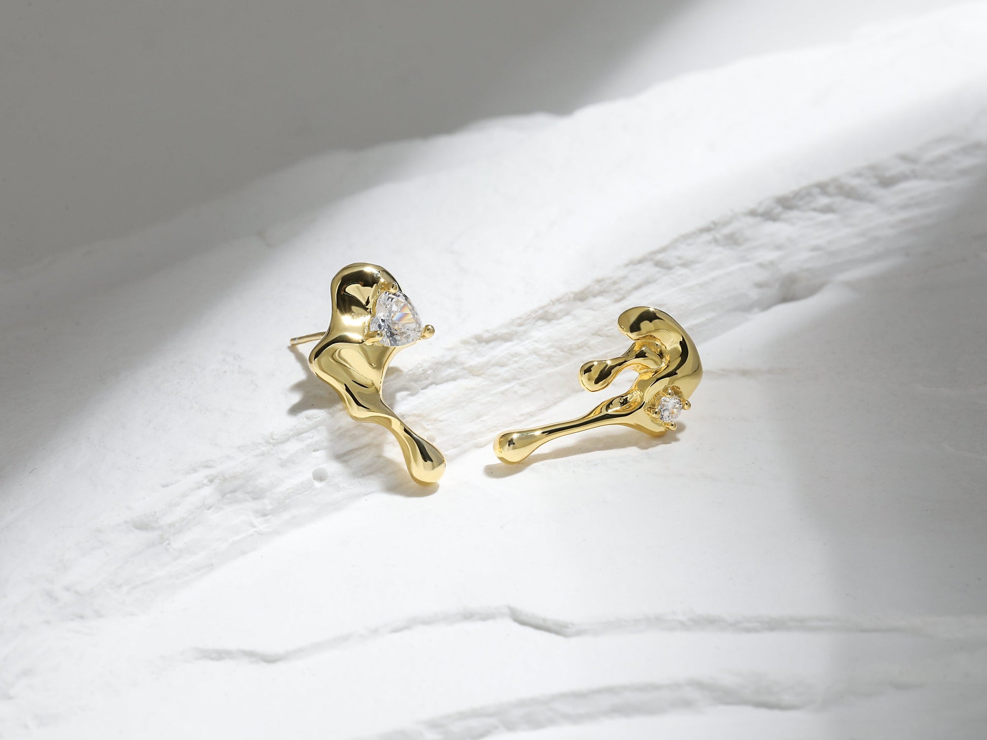 Edgy Dripping Metal CZ Earrings Edgy Dripping Metal CZ Earrings: Bold Statement Lava and Melting Liquid Designer Earrings