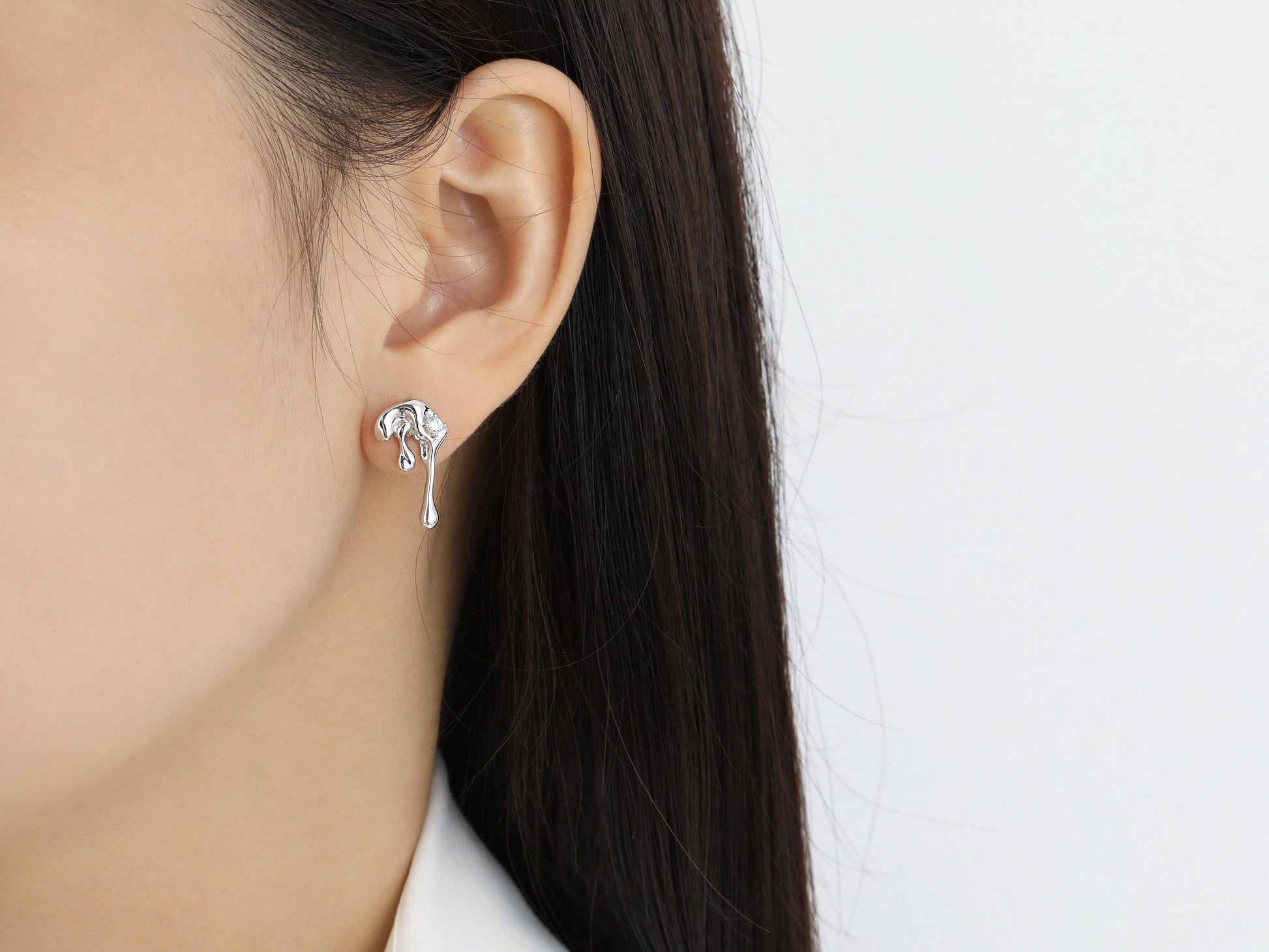 Edgy Dripping Metal CZ Earrings Edgy Dripping Metal CZ Earrings: Bold Statement Lava and Melting Liquid Designer Earrings