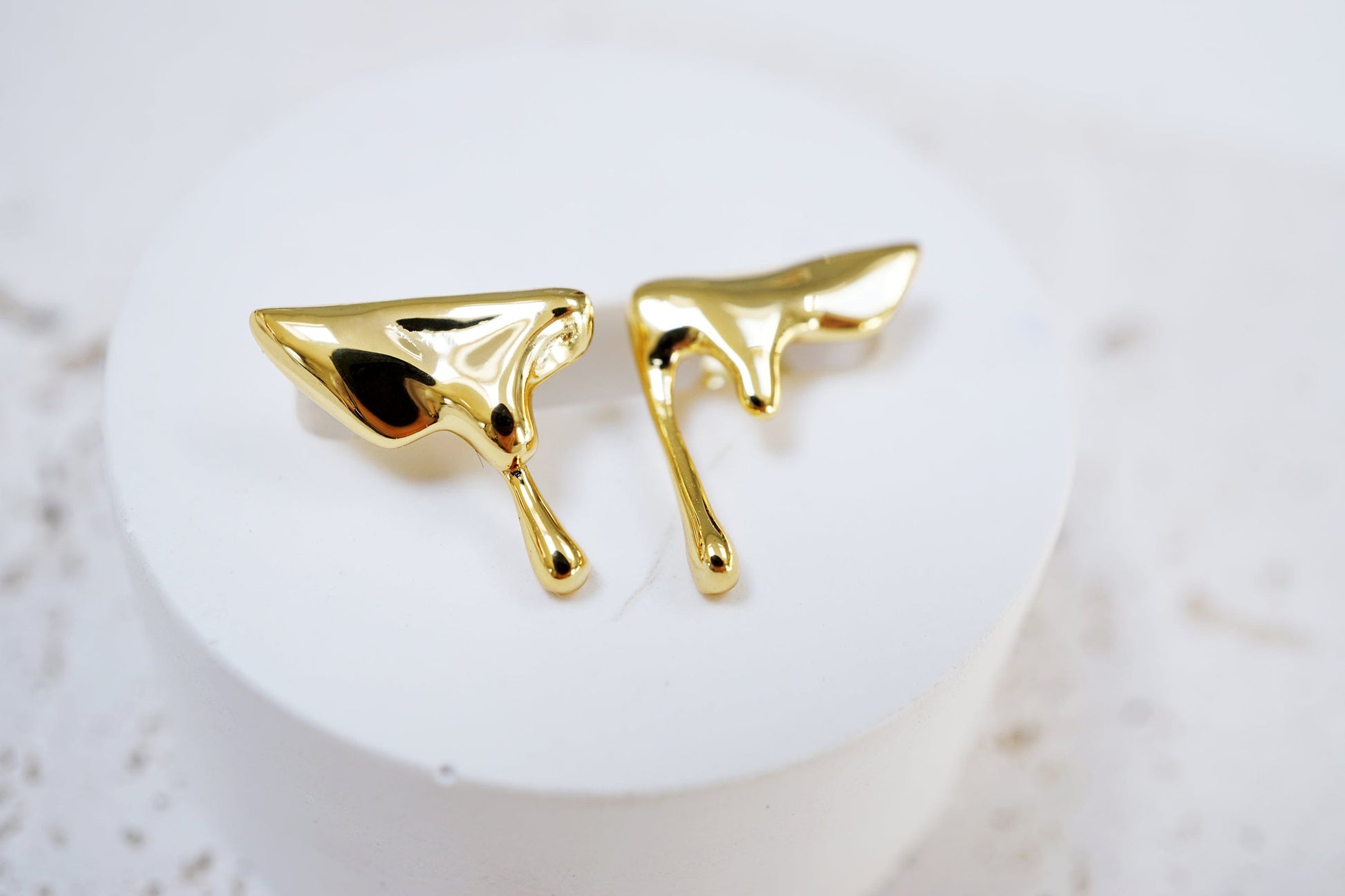 Dripping Molten Earrings Elevate Your Style with Dripping Molten Earrings: Bold Lava, Melting Liquid, and Edgy Designer Statement Pieces