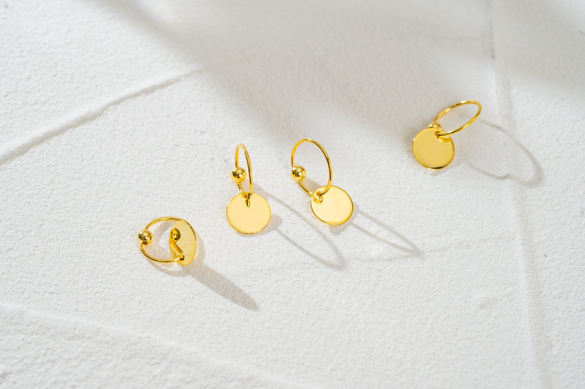 Gold and Silver Disc Charm Huggie Hoop Earrings Gold and Silver Disc Charm Huggie Hoop Earrings