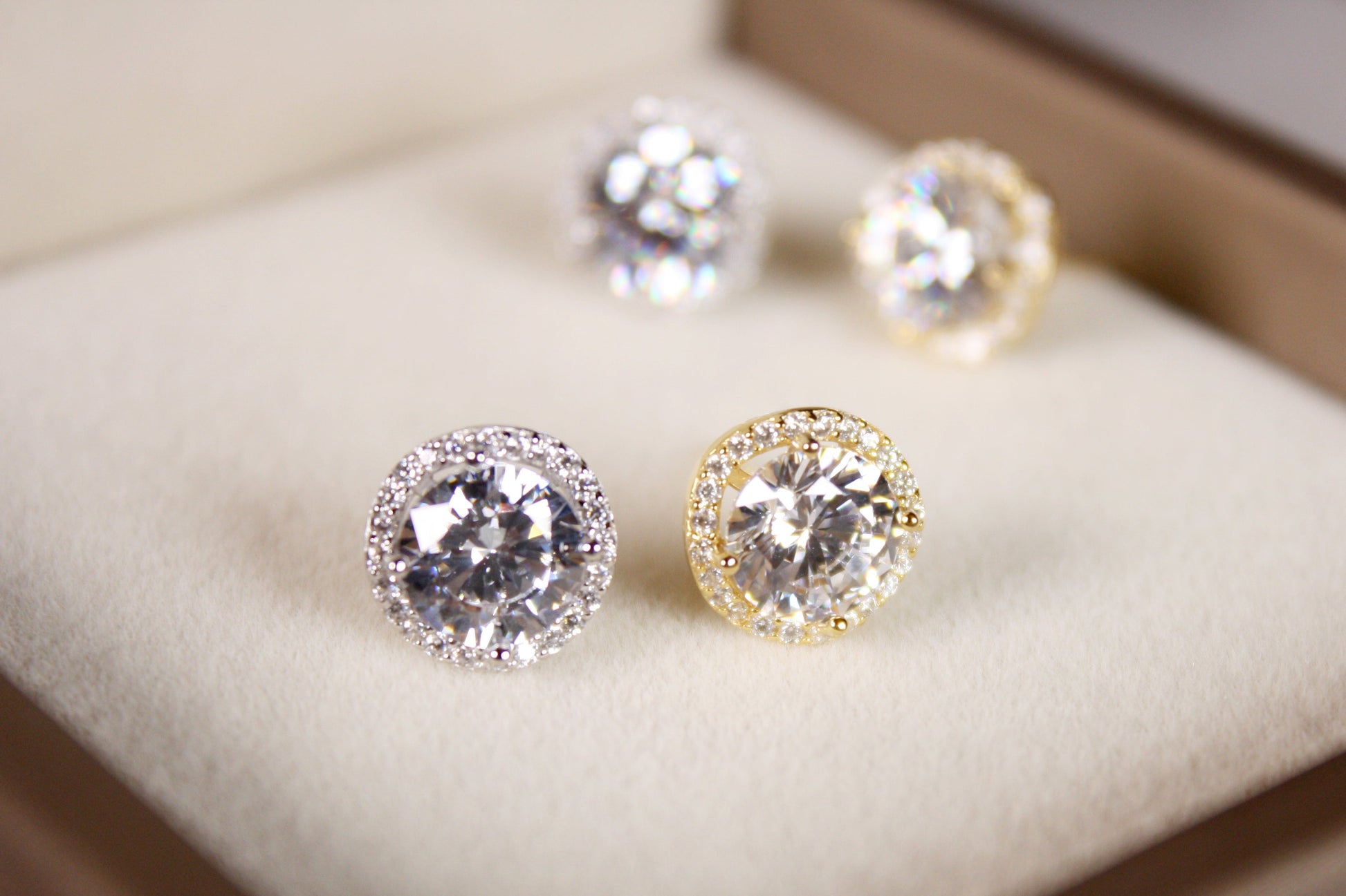 Pair of diamond earrings in a box