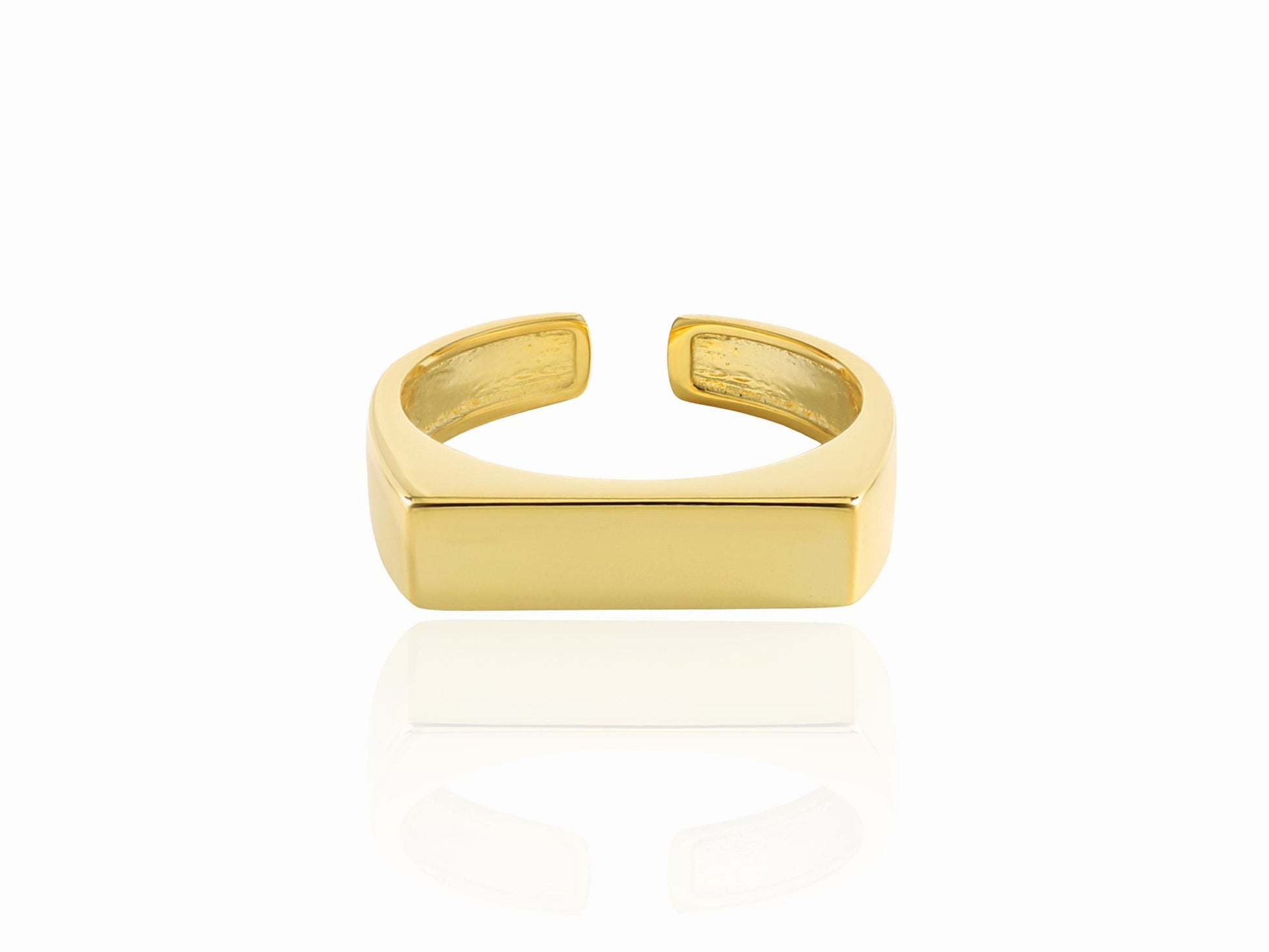Gold ring on a white background