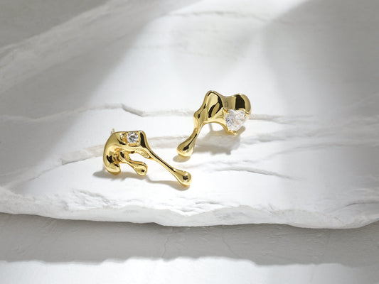 Edgy Dripping Metal CZ Earrings Edgy Dripping Metal CZ Earrings: Bold Statement Lava and Melting Liquid Designer Earrings