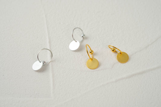 Gold and Silver Disc Charm Huggie Hoop Earrings Gold and Silver Disc Charm Huggie Hoop Earrings
